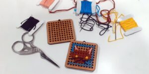 Brinco bordado divulgação