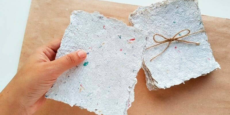 Papelaria viva - encadernação com papéis reciclados flyer
