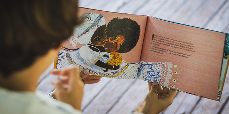 Imagem publicada pela fonte para Biblioteca Itinerante: Infâncias